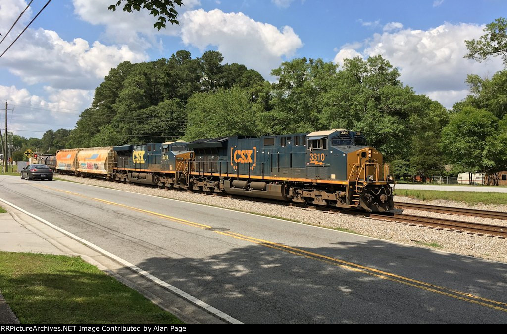 CSX 3310 and 5214 pass College St